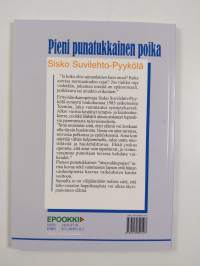 Pieni punatukkainen poika