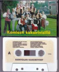C-kasetti Rientolan kaksiriviset - Komiasti kaksirivisillä, 1990. Katso kappaleet alta/kuvista.