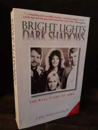 Bright Lights - Dark Shadows: The Real Story of ABBA
