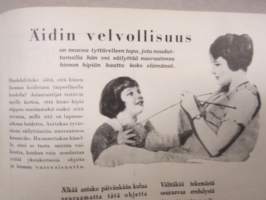 Kotiliesi 1928 nr 15, Kansikuva Hanna Rönnberg - Saariston tyttö, Lasten kasvattamisesta, Kotihyönteisemme, Kaupunkilaisen kokemuksia vaatteidenpesusta, Kesäkäsityö