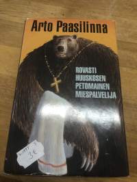 Arto Paasilinna: Rovasti  Huuskosen petomainen miespalvelija. P.1996. Suuri  suomalainen kirjakerho
