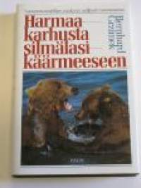 Harmaakarhusta silmälasikäärmeeseen