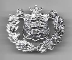 Guernseyn poliisin  kolardi  - poliisin merkki  metallia - poliisi