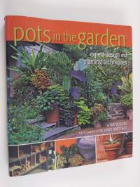 Pots in the garden : expert design and planting techniques