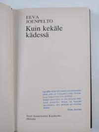 Kuin kekäle kädessä