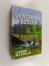 Lentokone suolla (signeerattu, tekijän omiste)