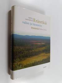 Eräretkiä valon ja hämärän maassa : valitut tarinat