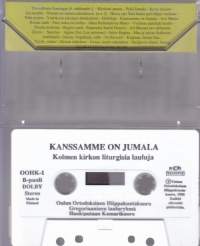 C-kasetti - Kanssamme on Jumala - Kolmen kirkon liturgisia lauluja, 1995. OOHK-1.  Katso kappaleet alta/kuvasta.