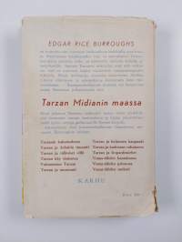 Tarzan Midianin maassa : apinain Tarzanin uusia seikkailuja Midianin maassa