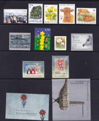 Suomen postimerkit ja postimerkkivihkot 2000 = Finnish stamps and stamp booklets = Finska frimärken och frimärkshäften = Finnische briefmärken und briefmarkenheft...