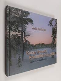 Kultaa taivaalla kristallia hangella