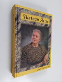 Tusinan äitee
