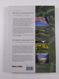 Hetkiä luonnossa : vuodenkierto kuvina = Wildlife moments : the four seasons in photographs