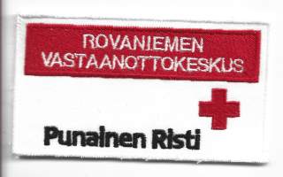 Rovaniemen Vastaanottokeskus Punainen Risti- hihamerkki