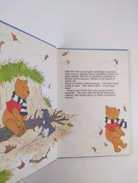 Nalle Puh ja tuulinen päivä : Disneyn satulukemisto