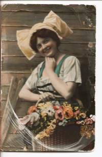 Kukkaistyttö -  postikortti kulkenut 1909 merkki pois
