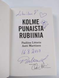 Kolme punaista rubiinia (signeerattu, tekijän omiste)