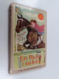 En flicka i sadeln