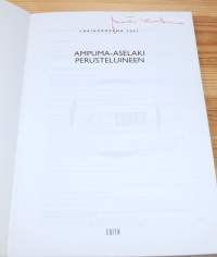 Ampuma-aselaki perusteluineen