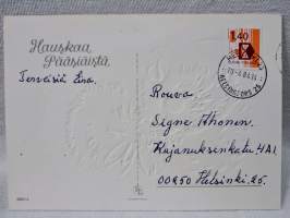 pääsiäiskortti Tipu kukkahattu päässä v.1984