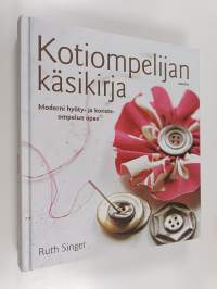 Kotiompelijan käsikirja : moderni hyöty- ja koristeompelun opas