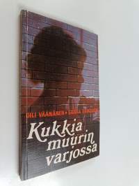 Kukkia muurin varjossa : elämäntarina