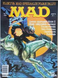 Elokuva Mad /1991 - Spesiaalin pojan kotiinpaluu  (Sarjakuva-albumi, sopiva keräilykappaleeksi)
