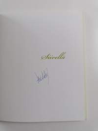 Siivellä (signeerattu)