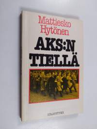 AKS:n tiellä