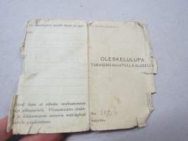 Oleskelulupa takaisinvallatulla alueella, Johanneksen kunnan esikunta, talollinen Emil Erland Puhakka, 3.11.1941, allekirjoitus poliisi Ananias Miettinen