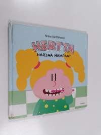 Hertta harjaa hampaat