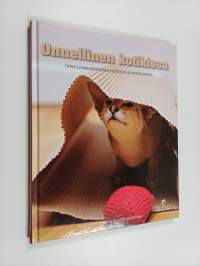 Onnellinen kotikissa : opas lemmikkikissan hoitoon ja aktivointiin