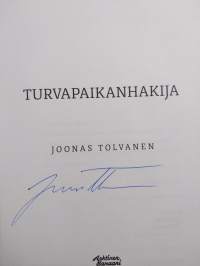 Turvapaikanhakija (signeerattu)