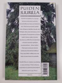Puiden juurilla : puut ja pensaat luonnossa ja kansanperinteessä