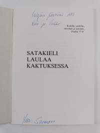 Satakieli laulaa kaktuksessa (signeerattu)