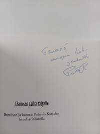 Elämisen taika taigalla : ihminen ja luonto Pohjois-Karjalan biosfäärialueella (signeerattu, tekijän omiste)