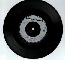 Rock yhtye Dire Straits  kappaleet : Money for Nothing ja Love over Gold vuonna 1985.