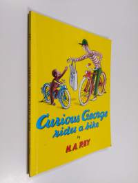 Curious George Rides a Bike