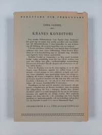 Kranes konditori : Interiör med figurer