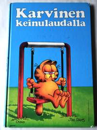 Karvinen keinulaudalla