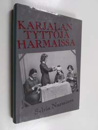 Karjalan tyttöjä harmaissa