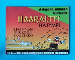 Haaraltti Häjympi - eteläpohjanmaan murteella.  Piremmän puukon päällikkö.   (Sarjakuvat, sarjakuva-albumi, sopiva keräilykappaleeksi)