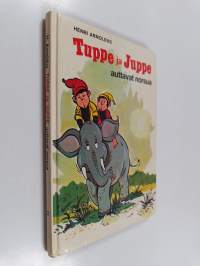 Tuppe ja Juppe auttavat norsua