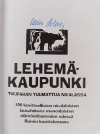Lehemäkaupunki : tulipahan tuumattua Nivalassa : 100 kuvitteellista nivalalaisten lausahdusta monenlaisten elämäntilanteiden edessä Ramin kuvittelemana (signeerattu)