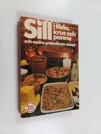 Sill i låda, krus och panna