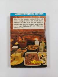 Sill i låda, krus och panna