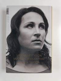 Tahto : Aino-Kaisa Saarisen kahdet kasvot