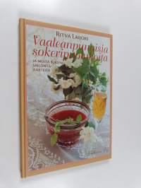 Vaaleanpunaisia sokeripuolukoita ja muita sukuni säilöntäaarteita