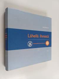 Lähellä ihmistä : osuuspankkitoiminta 100 vuotta