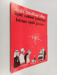 Lapset soittavat joululauluja - Barnen spelar julvisor